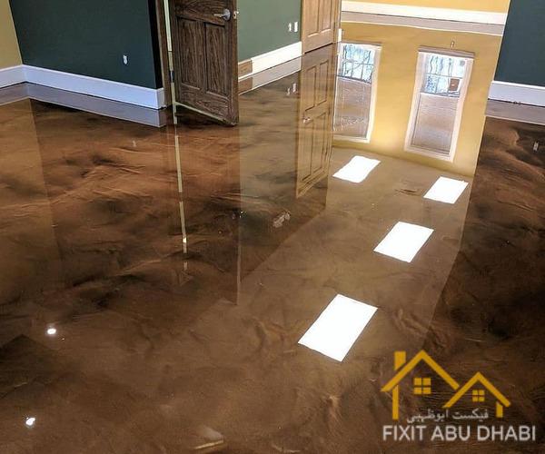 Shiny brown epoxy flooring in a modern living room