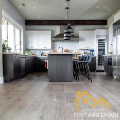 Modern kitchen with durable tile flooring in neutral tones